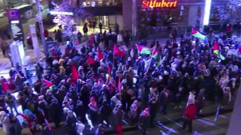 Montreal demonstrators clash with police, set off smoke bombs in destructive protest