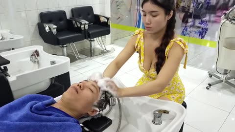 Relaxing shampoo service at Vietnamese barbershop for men