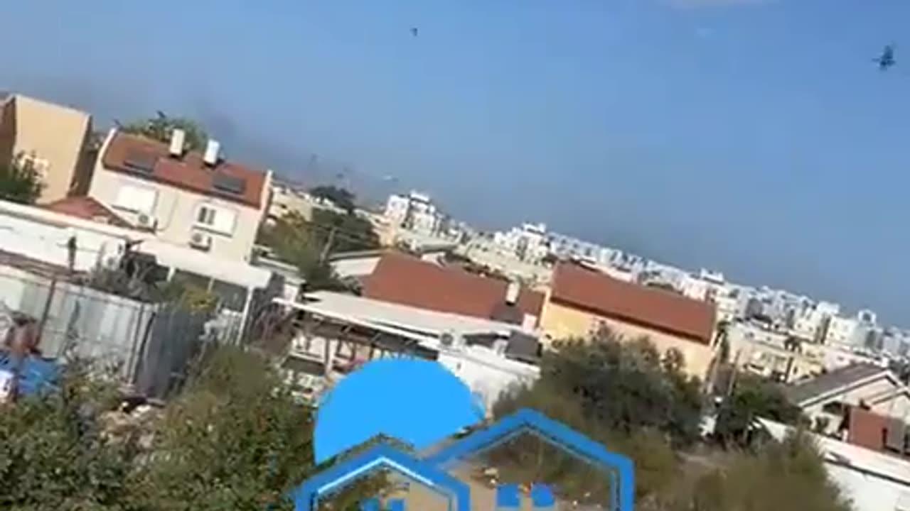 Footage shows the Iron Dome air defense system intercepting a barrage of rockets