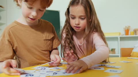 A Boy and a Girl Doing an Activity