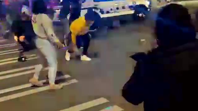 POLICE RUN OVER RIOTERS IN TACOMA, WASHINGTON