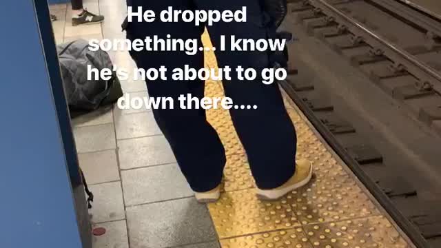 Pt. 2 man hops down to subway train tracks and picks up dropped item, climbs back up