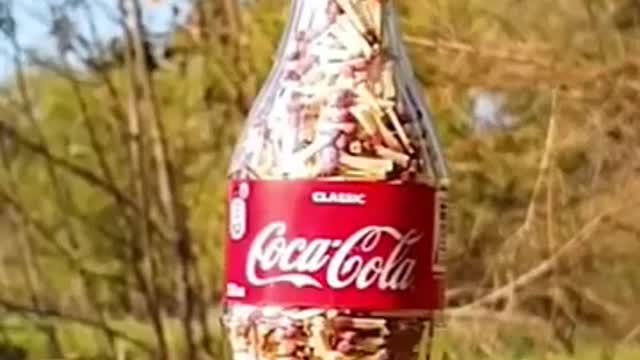 Fire work on coca cola bottle