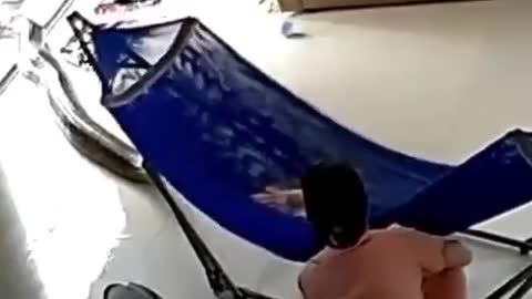 Mother trying to make his baby Sleep