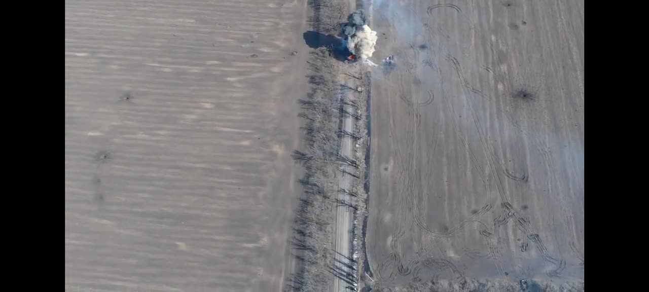 A tank explodes after passing a mine planted by the Ukrainian army in Donetsk