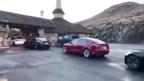 ⚠️Still want to buy an EV? Here's a Tesla charging line in California....