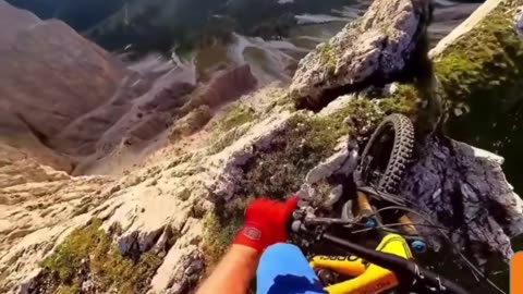 Cliffhanger Ride: Cyclist's Heart-Stopping Descent