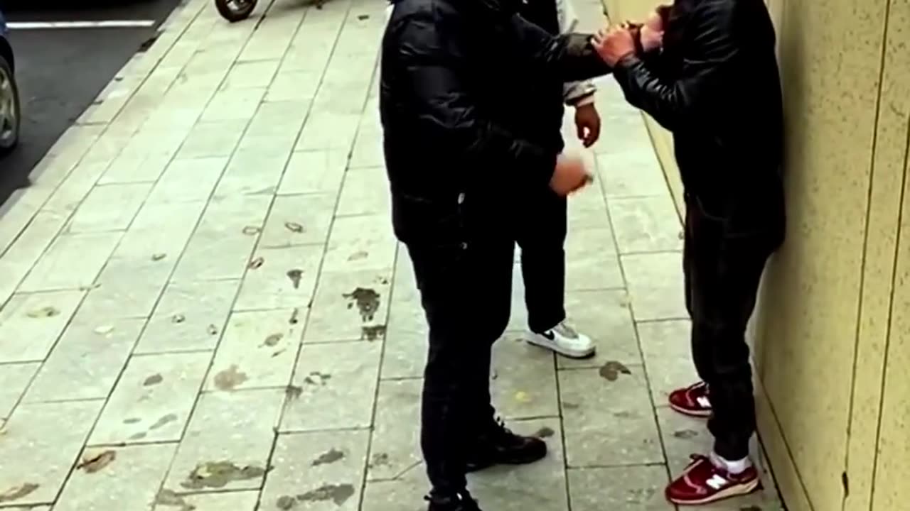 A dangerous Chinese street fight. In a way, a bit funny too.