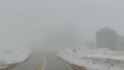 Foggy drive in the countryside