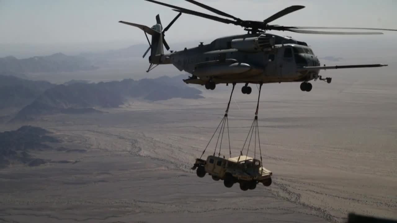 U.S. Marine Corps practices heavy lifts with CH-53