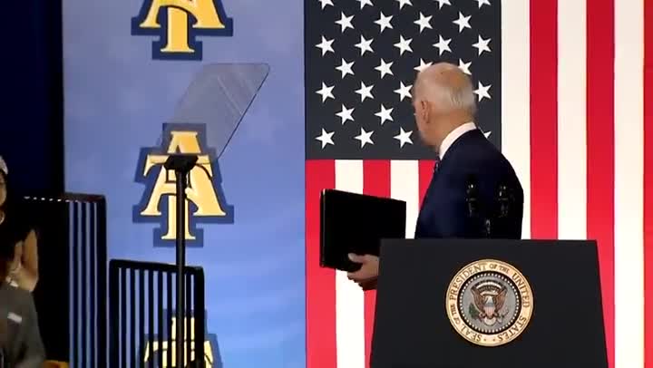 After Biden finished his speech, he turned around and tried to shake hands with thin air