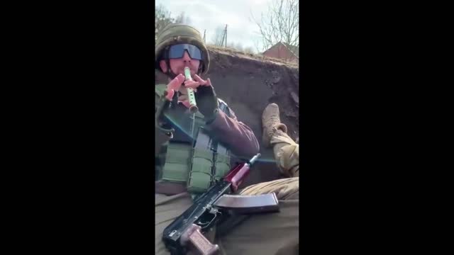 Soldier playing flute on front lines