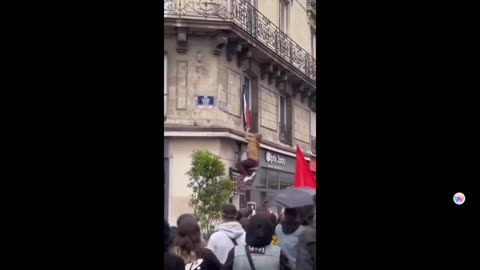 The French national flag is removed forcibly by ANTIFA in France 12-06-24