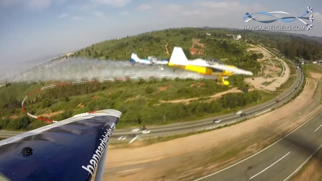 Three planes chained together pull off insane low pass stunt