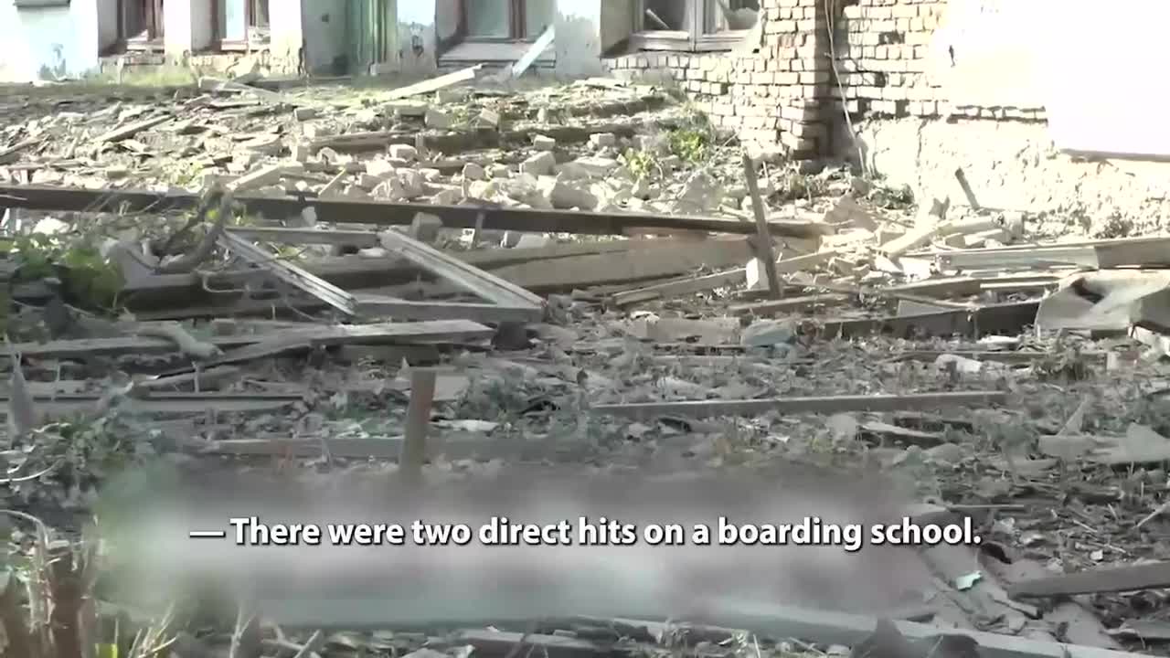 A boarding school in the village of Mironovskiy comes under fire from Ukraine.