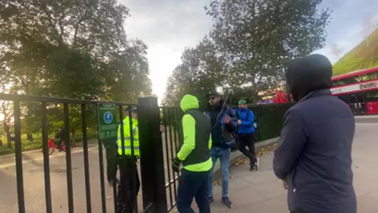 SPEAKERS CORNER WALEED ESCORTED OUTSIDE THE PARK BY POLICE