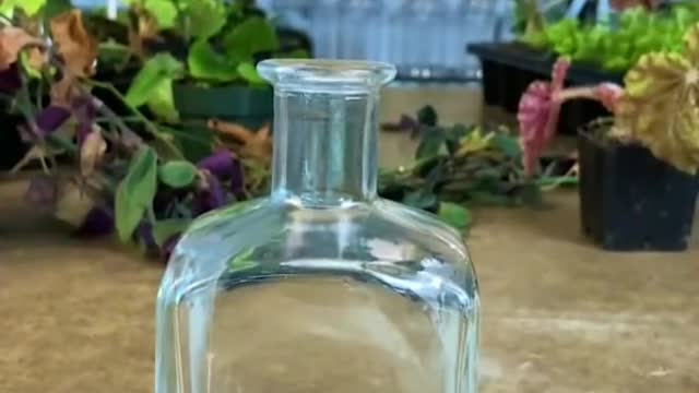 Have you tried turning a clear bottle?