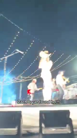 'Hawk Tuah' Girl stuns crowd at Zach Bryan show, sparking frenzy among fans. 🎤🌟