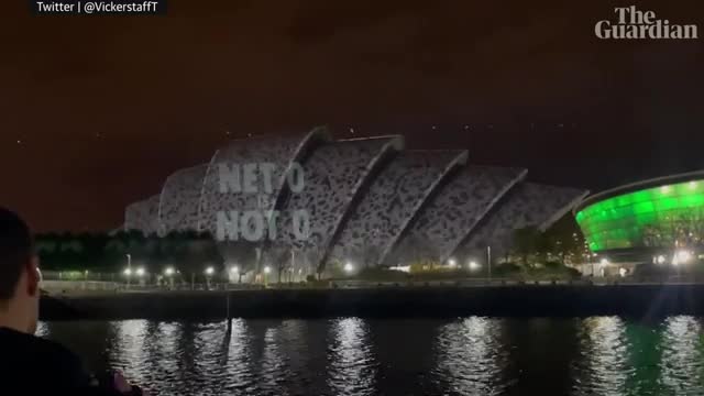 Protesters told to 'go away' on Cop26 building in projection face-off
