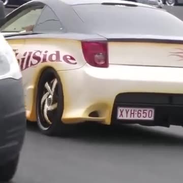 Roadside Rumble Cars Spin, Trees Grin, and B