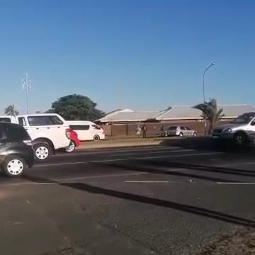 Dad dodges bullets as guards open fire