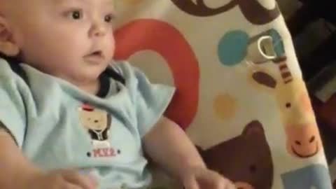 Silly Baby Boy goes crazy over a remote control