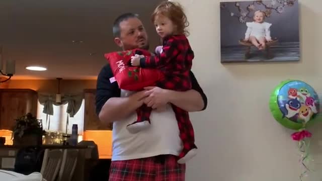 Toddler Gets Excited on Seeing Santa's Present