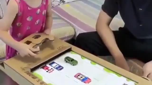 Dad made this game from cardboard for his daughter