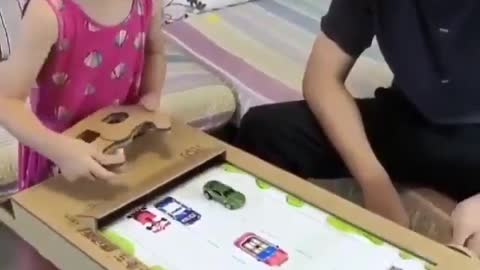 Dad made this game from cardboard for his daughter