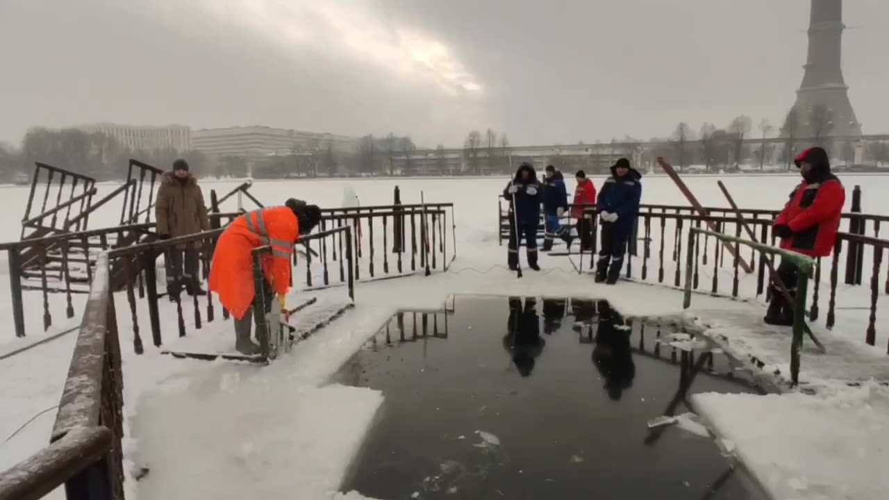 Russians setting things for their annual polar bear skinny dipping