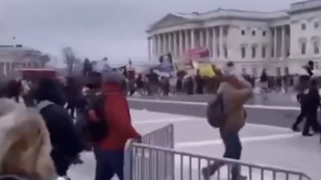 Cops letting "rioters" in the capital?