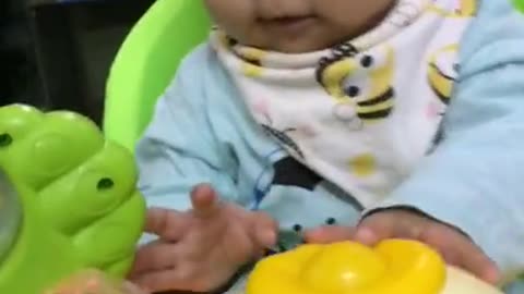 Baby girl plays at 4 months old!