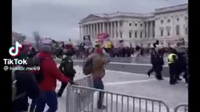 DC Police Urging Protesters through Barricade