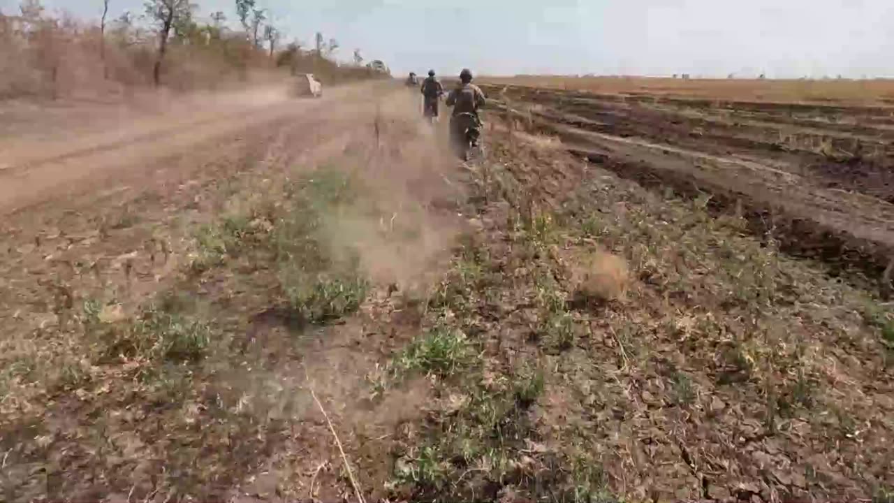 Russians Practicing Rapid Advance Using Dirt Bikes