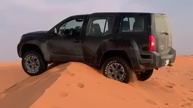 A car in the middle of desert