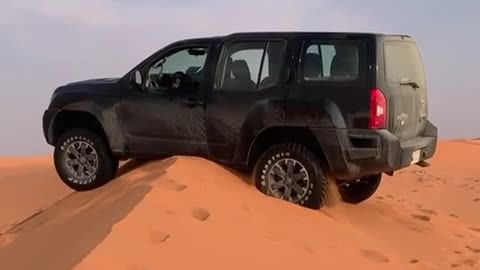 A car in the middle of desert