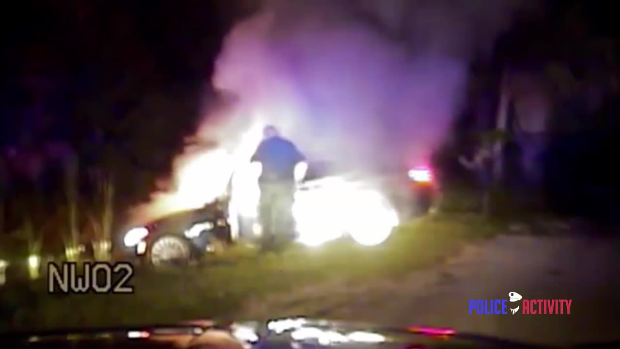 Dashcam Shows Cop Rescue Man From Burning Car