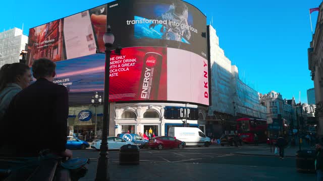 Low Angle Footage Of Picadilly Circus Road Junction In Daylight