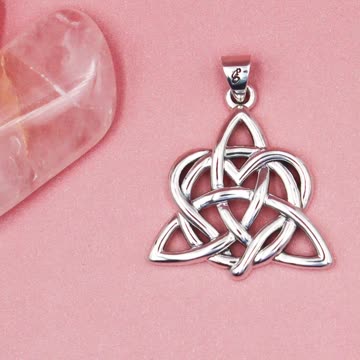 Discover Elegance: Triquetra Heart Silver Pendant