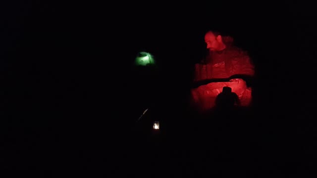 Night time by a campfire