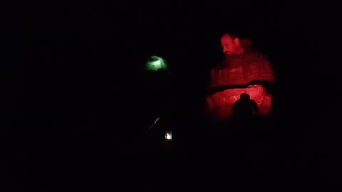 Night time by a campfire