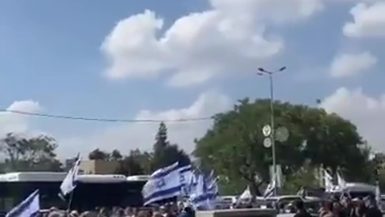 Thousands of people line the roads of Jerusalem to pay their last goodbye to