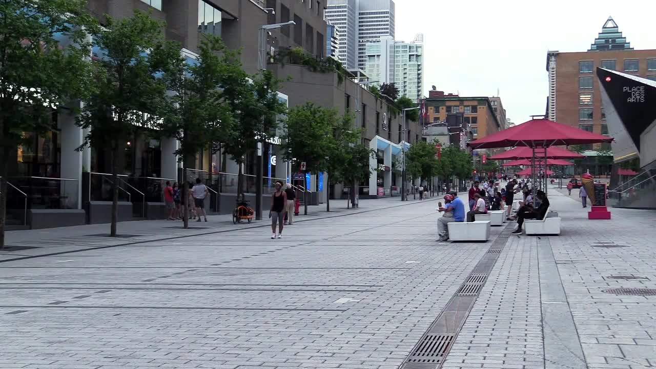 People Spending Their Time In A Walking Street