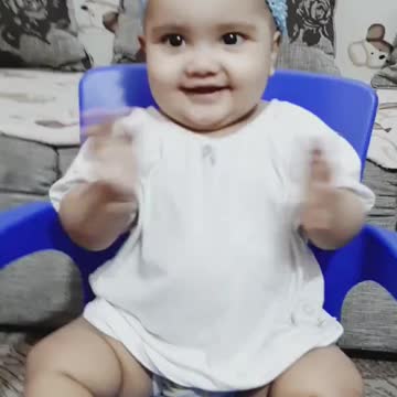 Cute baby playing with