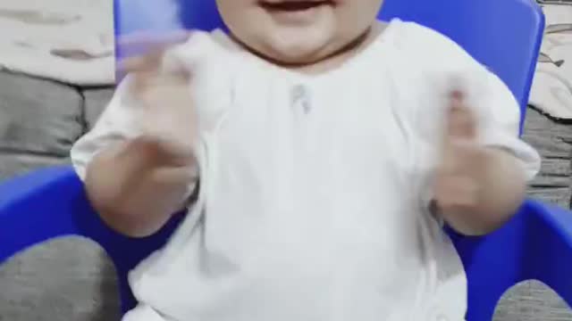 Cute baby playing with