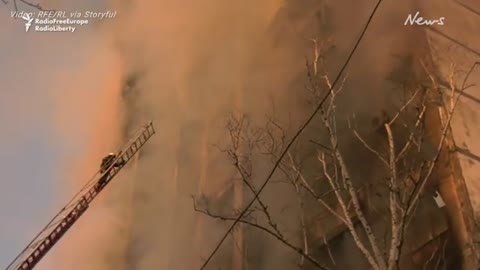Kyiv fire crews tackle blaze in apartment block following Russian strike