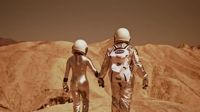 An Astronaut Couple Walkin