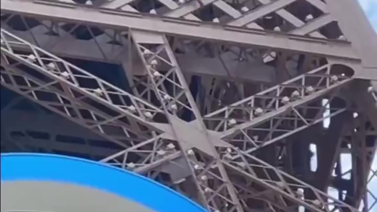 Breaking News: Man Climbs Eiffel Tower During Olympics | Shocking Footage