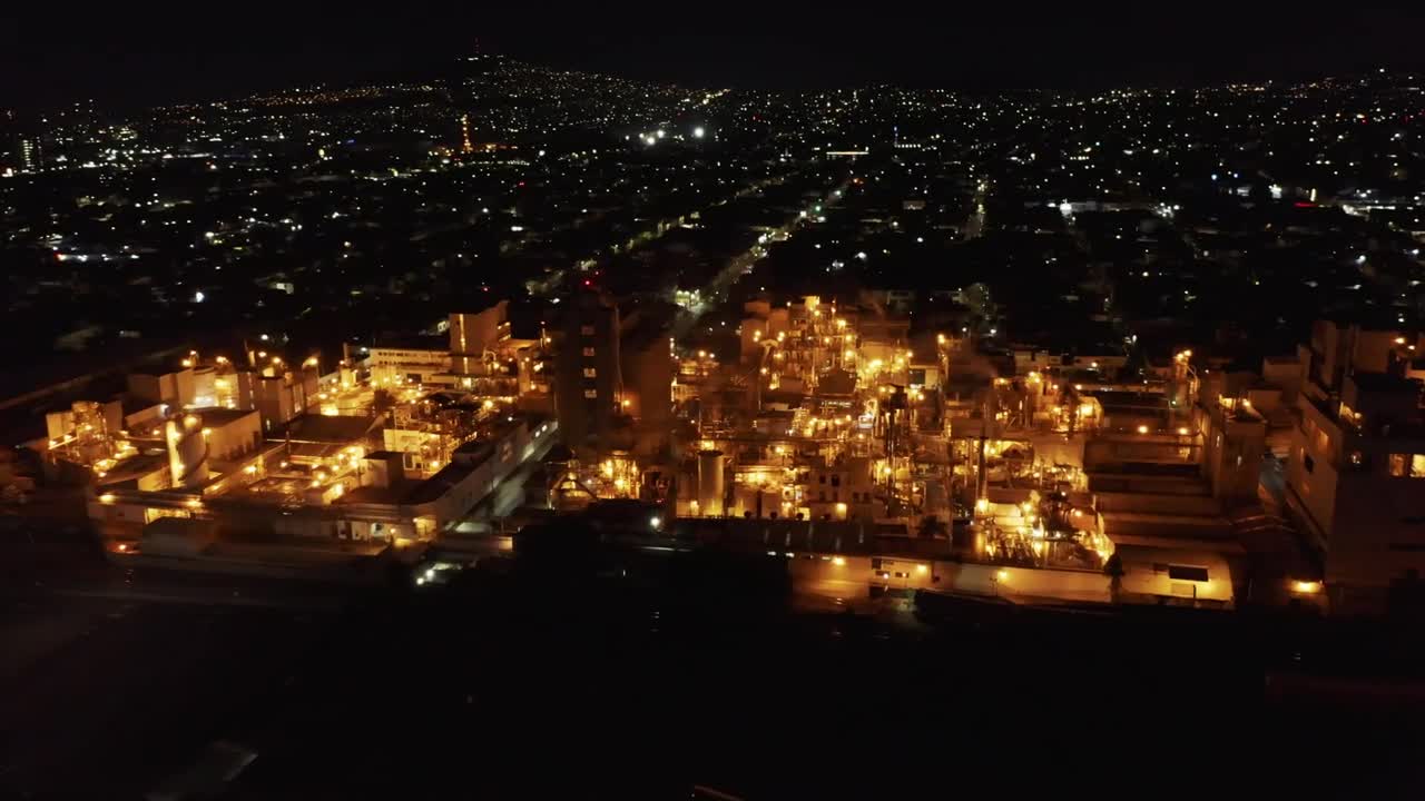 Aerial view of a factory at night time