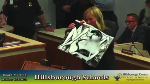Cop stops mom from exposing what's in book available to kids, school district panics